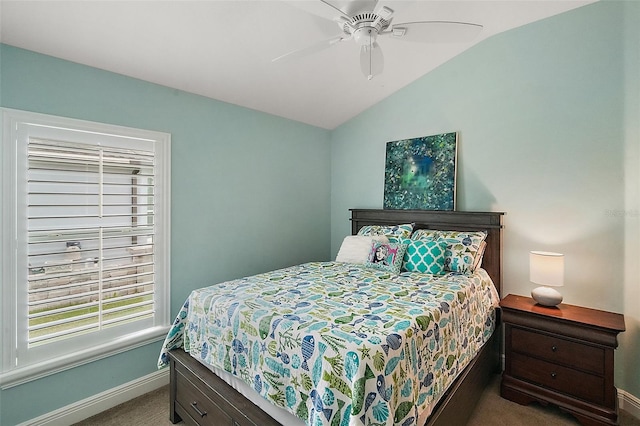 carpeted bedroom featuring ceiling fan and lofted ceiling