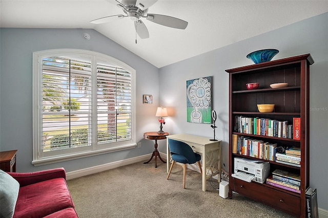 office space with carpet, ceiling fan, and vaulted ceiling