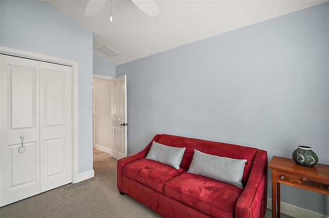 sitting room featuring carpet, ceiling fan, and lofted ceiling