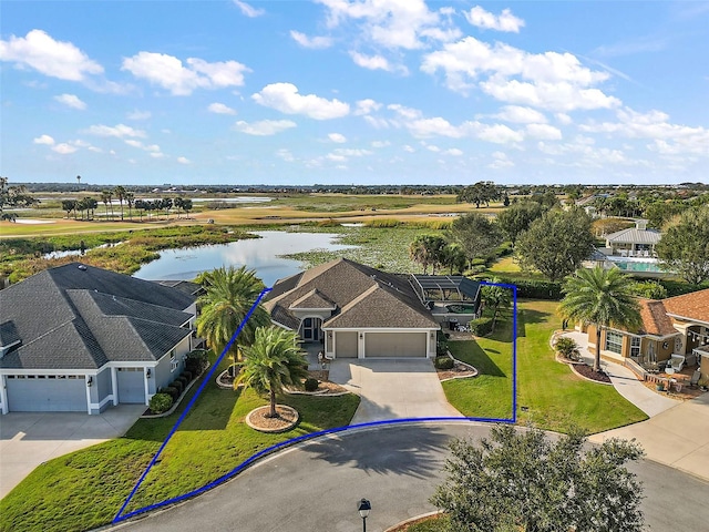 aerial view featuring a water view