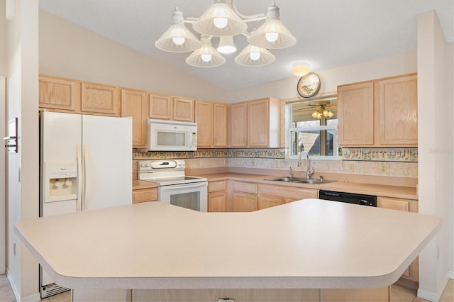 kitchen with light brown cabinets, white appliances, backsplash, sink, and vaulted ceiling