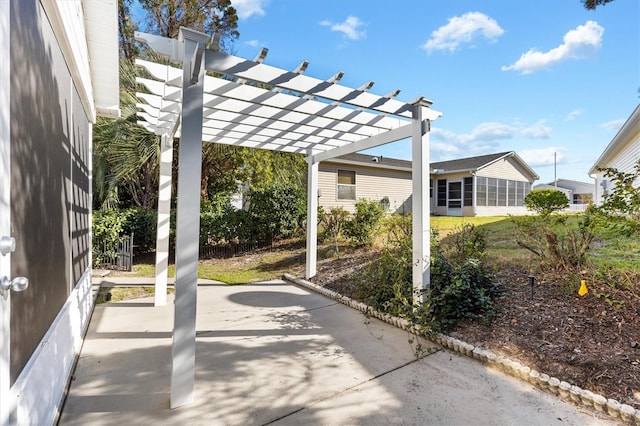 view of patio featuring a pergola