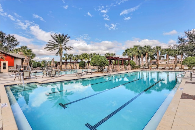 view of pool featuring a patio area