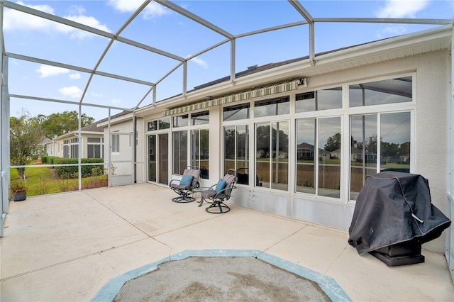 exterior space with a lanai and a patio area