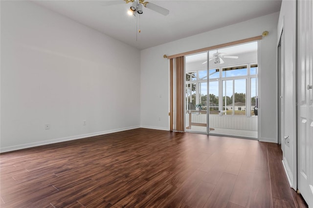 unfurnished room with ceiling fan and dark hardwood / wood-style floors