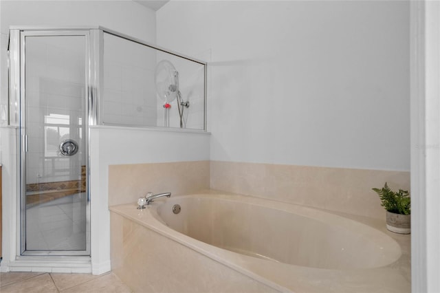 bathroom featuring tile patterned floors and plus walk in shower