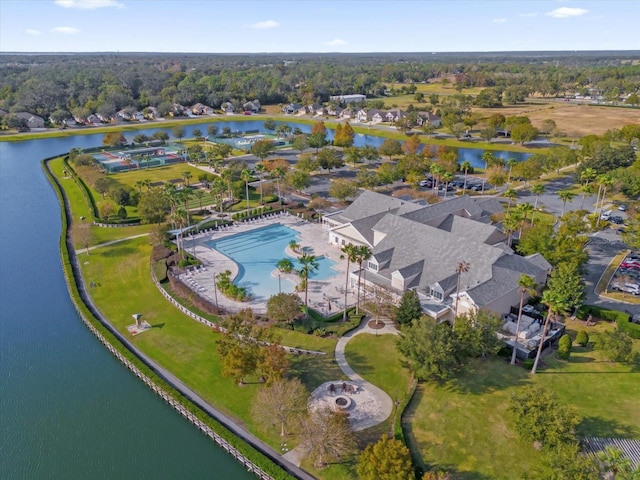 birds eye view of property with a water view