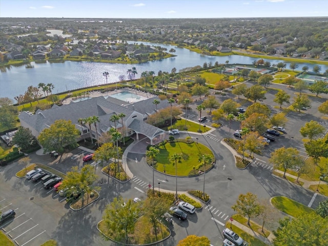 birds eye view of property featuring a water view