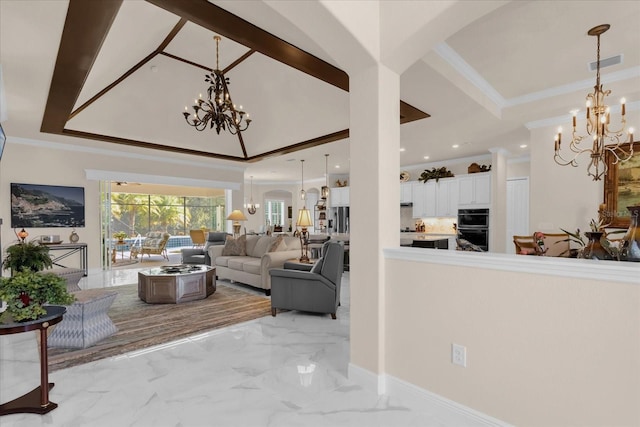 living room featuring a tray ceiling, ornamental molding, and a notable chandelier