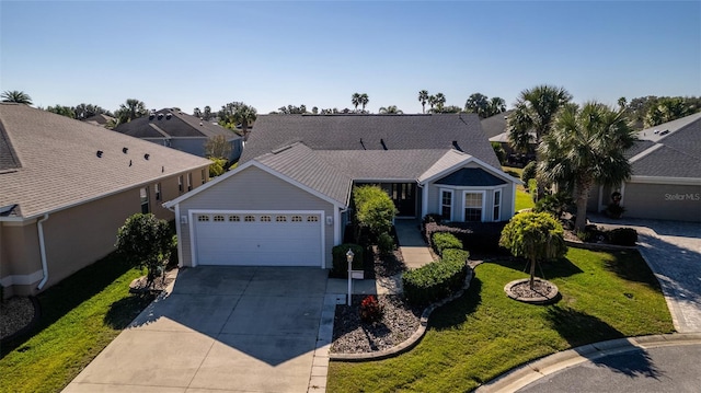 ranch-style house featuring a garage and a front lawn