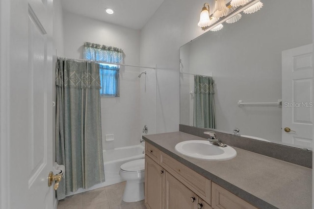 full bathroom with tile patterned flooring, shower / bath combo, vanity, and toilet