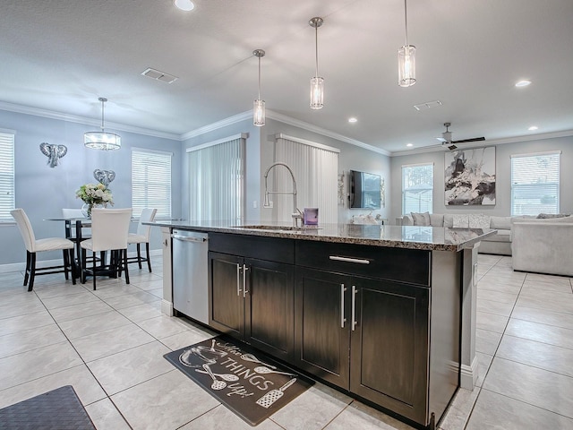 kitchen featuring stainless steel dishwasher, ceiling fan, sink, and hanging light fixtures