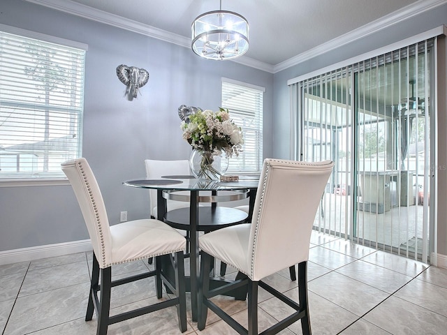 tiled dining space featuring ornamental molding and a notable chandelier