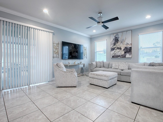 tiled living room featuring crown molding and ceiling fan