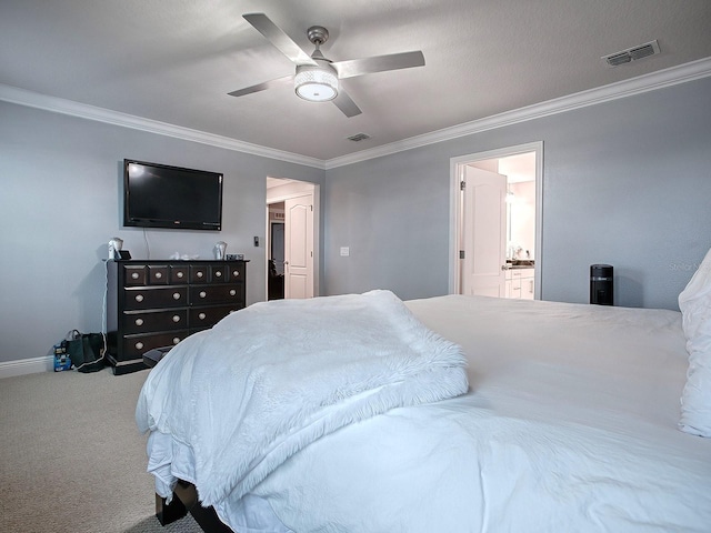 carpeted bedroom featuring ceiling fan, crown molding, and connected bathroom