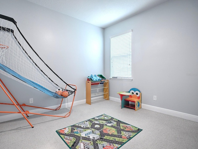 rec room with carpet flooring