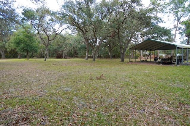 view of yard with a carport