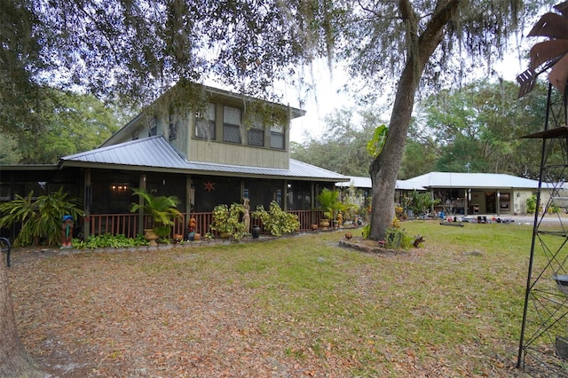 view of front of property with a front yard and a porch