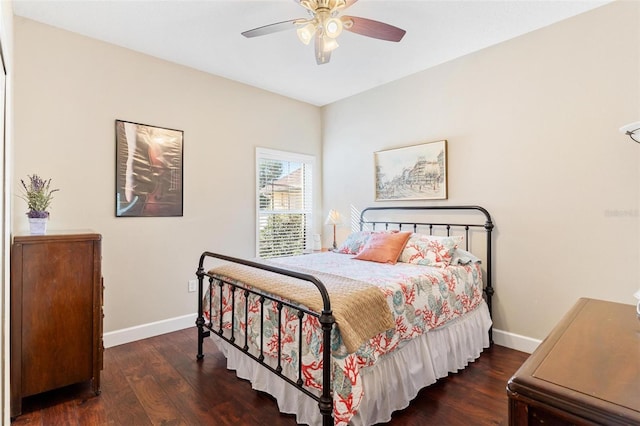 bedroom featuring dark hardwood / wood-style floors and ceiling fan