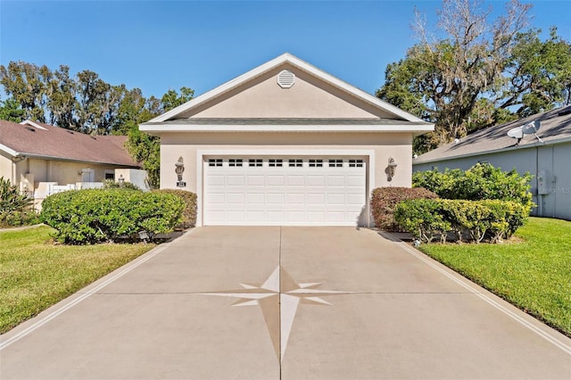 ranch-style house with a front lawn and a garage