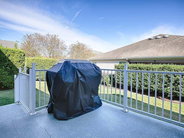 view of patio featuring a grill