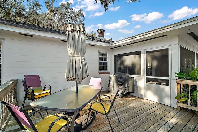 wooden deck with area for grilling