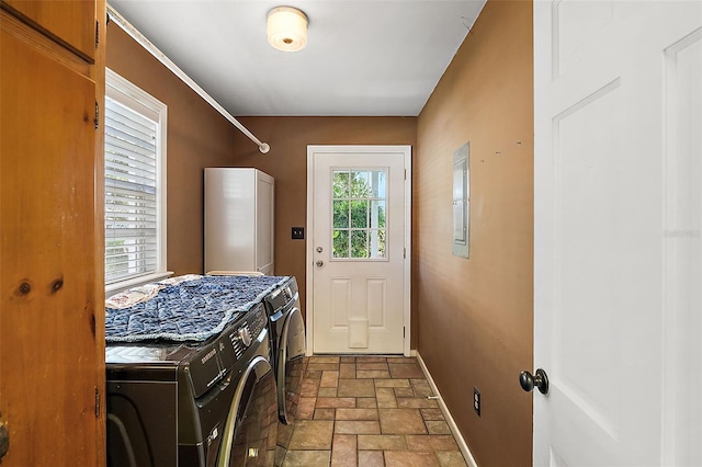 laundry area with separate washer and dryer