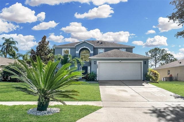 view of front facade with a front lawn, a garage, and cooling unit