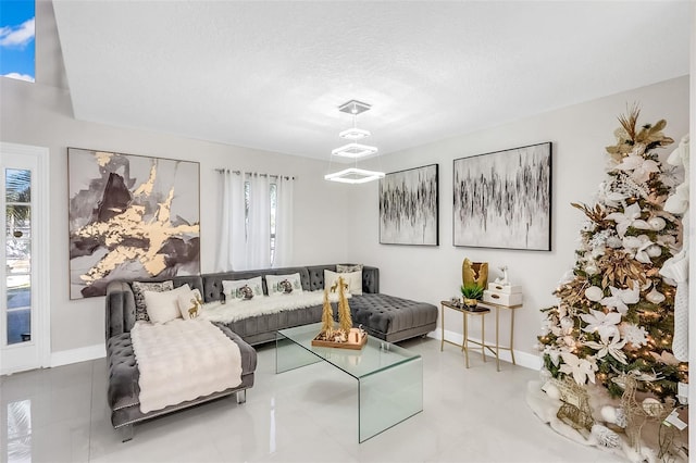 living room featuring a textured ceiling