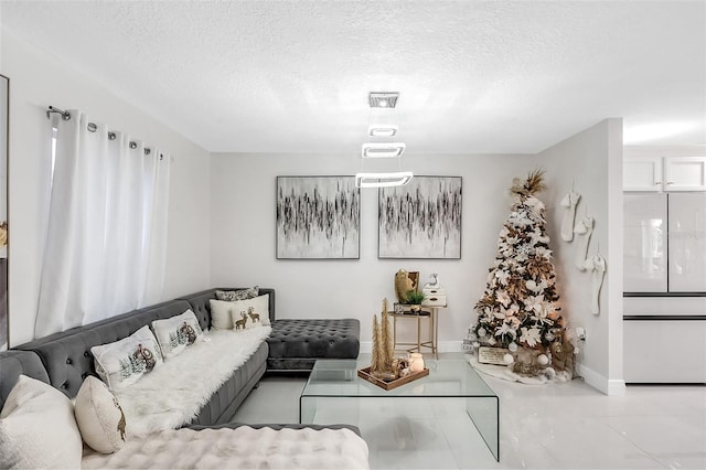 living room with a textured ceiling