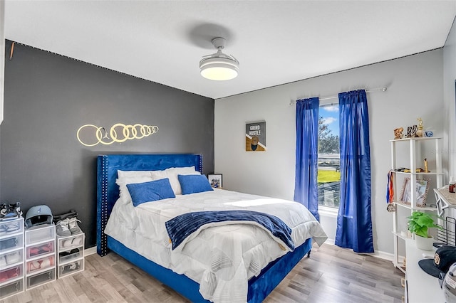 1087 Welch Hill Cir, Apopka, FL 32712 - bedroom featuring wood finished floors and baseboards