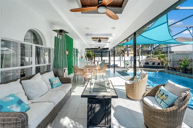 interior space featuring a pool and ceiling fan