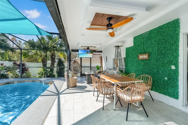 exterior space with a patio area, ceiling fan, and a lanai