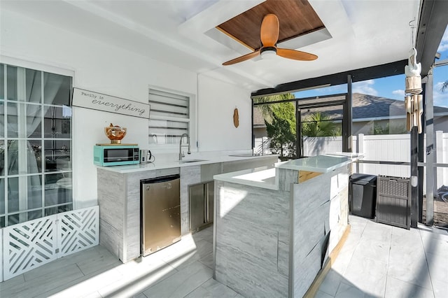 1087 Welch Hill Cir, Apopka, FL 32712 - kitchen with a kitchen island, fridge, stainless steel microwave, a sink, and a ceiling fan