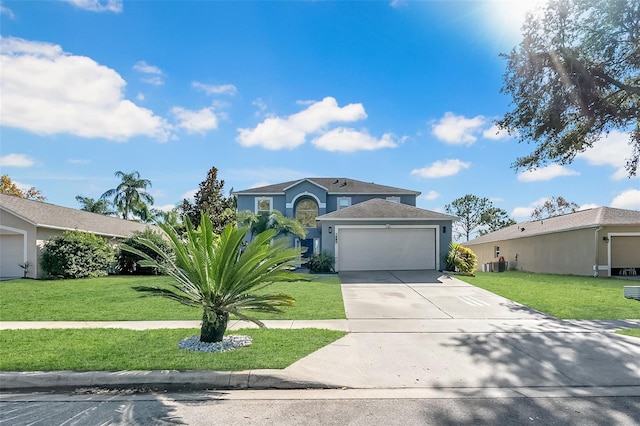 view of front of home featuring cooling unit, a front yard, and a garage