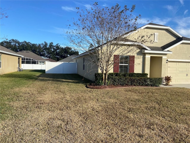 view of property exterior with a lawn