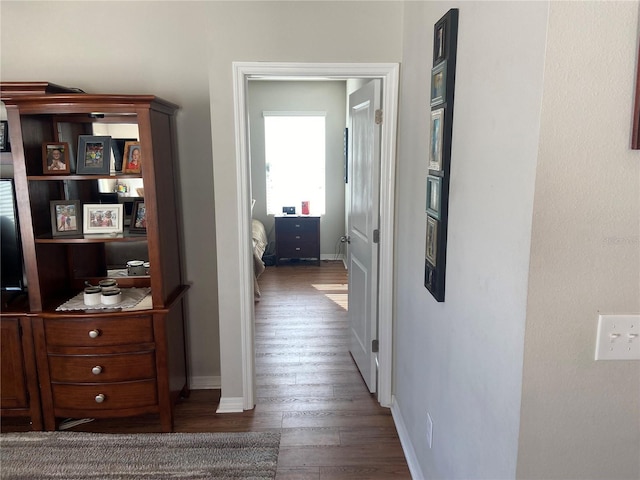 hall featuring dark hardwood / wood-style floors