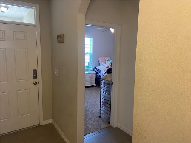 entrance foyer with tile patterned flooring