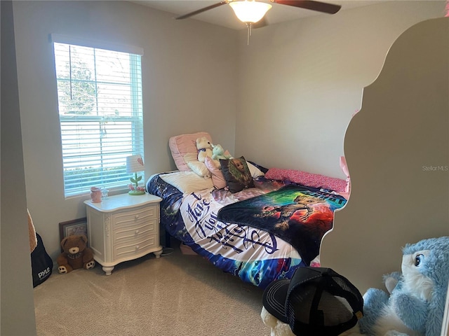 bedroom featuring ceiling fan and carpet floors