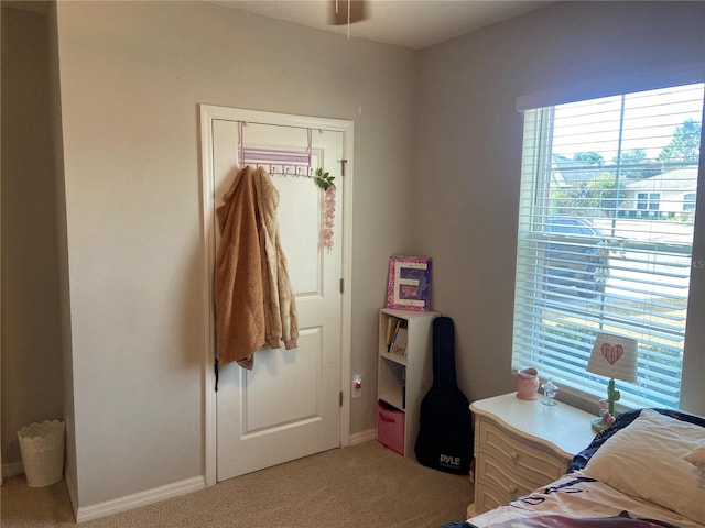 carpeted bedroom featuring a closet