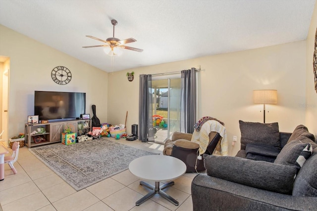 tiled living room featuring vaulted ceiling and ceiling fan