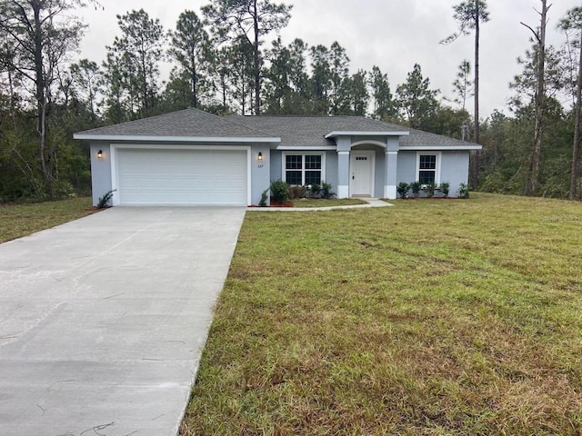 single story home featuring a front yard and a garage