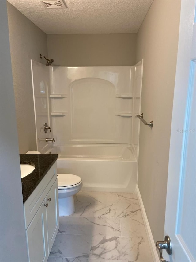 full bathroom featuring vanity, shower / bathtub combination, toilet, and a textured ceiling