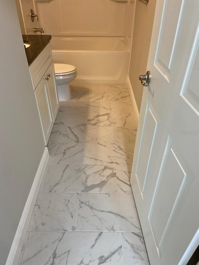 full bathroom featuring vanity, toilet, and bathtub / shower combination