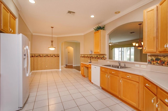 kitchen with decorative light fixtures, sink, crown molding, white appliances, and light tile patterned flooring