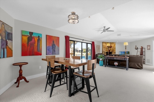 9 Crow Ct, Palm Coast, FL 32137 - carpeted dining space featuring lofted ceiling and ceiling fan