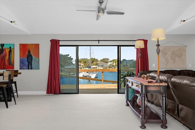 9 Crow Ct, Palm Coast, FL 32137 - carpeted living area with ceiling fan and a water view