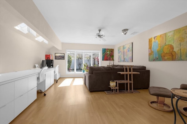 9 Crow Ct, Palm Coast, FL 32137 - living room with light wood-type flooring, a desk, and a ceiling fan