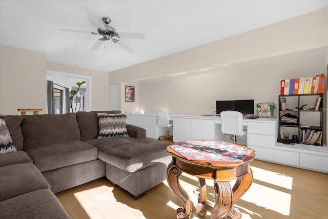 9 Crow Ct, Palm Coast, FL 32137 - living area with a desk, light wood-style floors, and ceiling fan