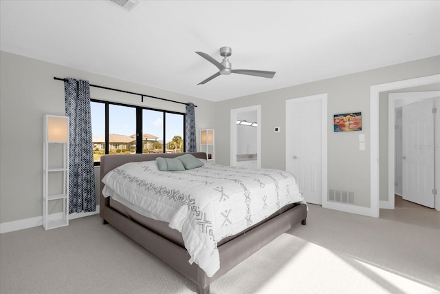 9 Crow Ct, Palm Coast, FL 32137 - bedroom featuring carpet flooring, a ceiling fan, and ensuite bathroom